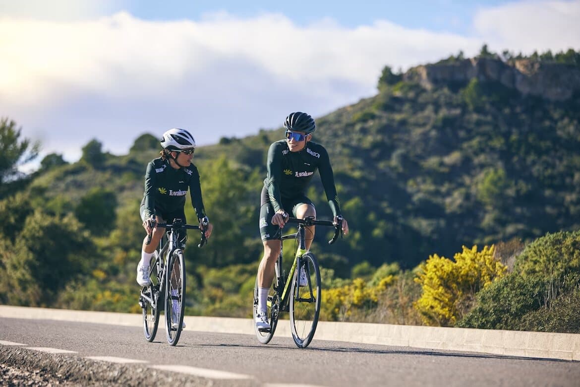 Two people cycling