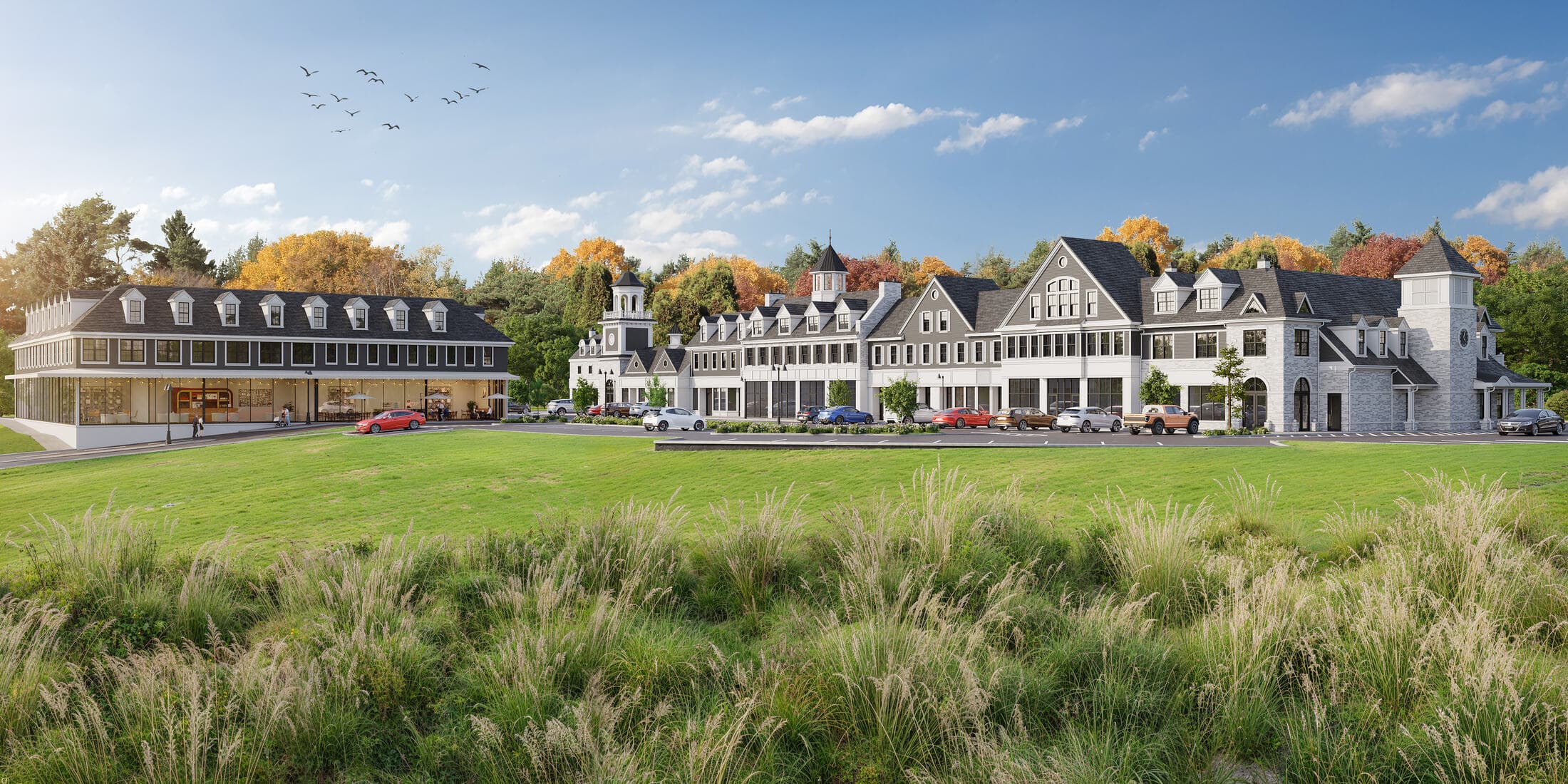 Architectural rendering of the Cohasset Crossing retail buildings across the lawn