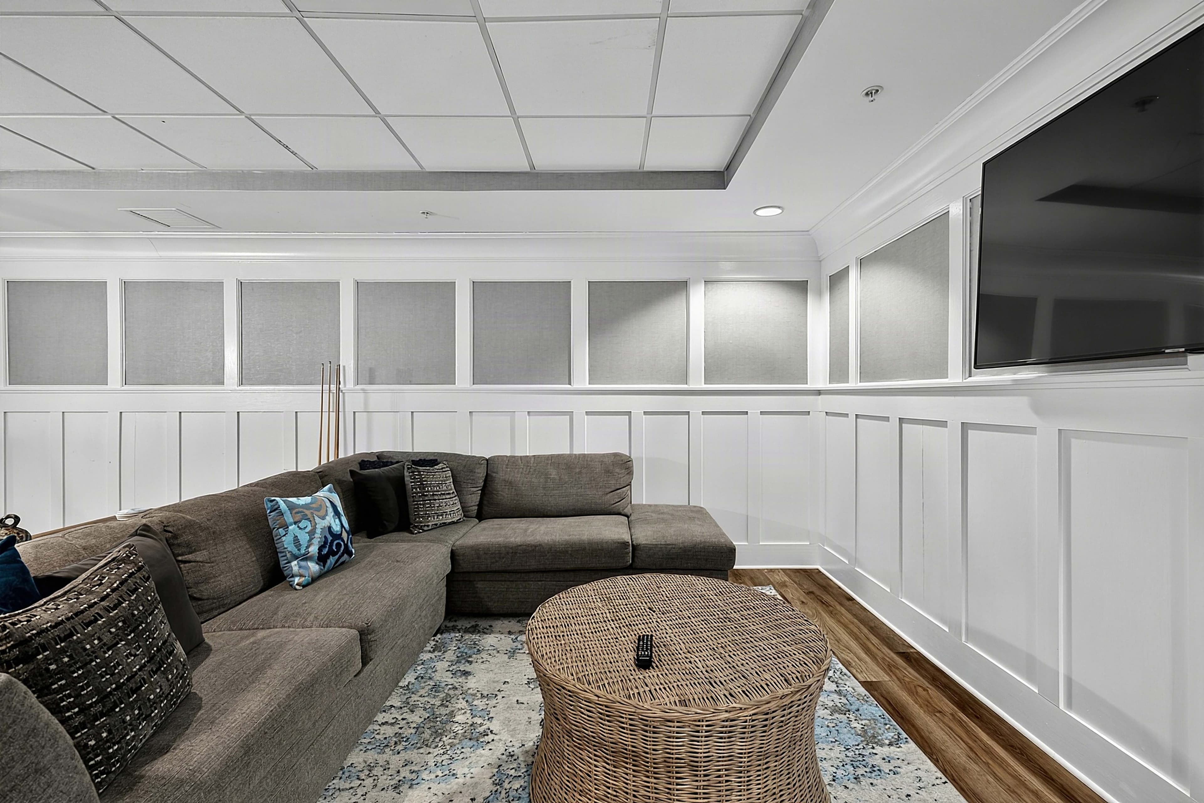 Sofa seating arranged beside the television